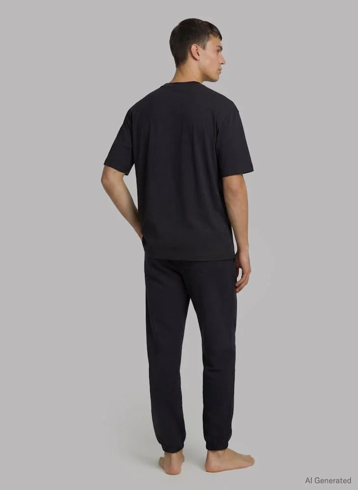 كالفن كلاين قميص بيجامة قطن مطاطي أيقوني